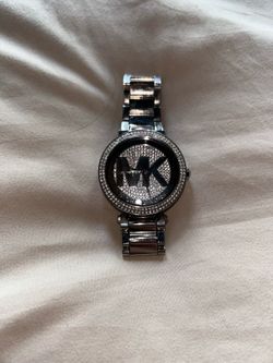 MK women’s silver watch