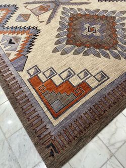 Native American Zia design with fether rug in 8.8” X 11.8”