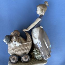 Lladro girl with cart wagon puppies