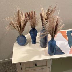 Assorted Blue Vases With Dried Grasses