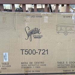 Ashley Rustic Accents Coffee Table (Brand New)