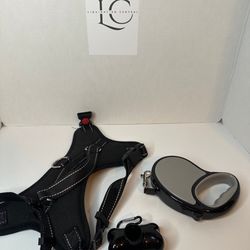 Retractable dog leash with large harness and waste bag dispenser