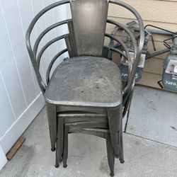 Four Metal Chairs 