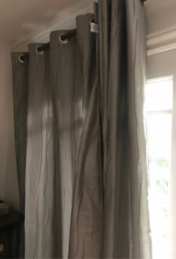Grey curtain sets two sets available