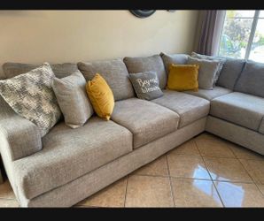 Beautiful beige sectional couch from Jerome’s