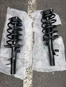 Front Complete Strut Assemblies with Coil Springs – Ford Transit Connect (Pair)