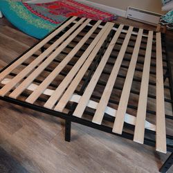 Queen bed frame with wooden plates