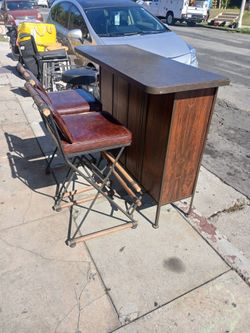 mid-century modern style dry bar cabinet Pair of Campaign Barstools