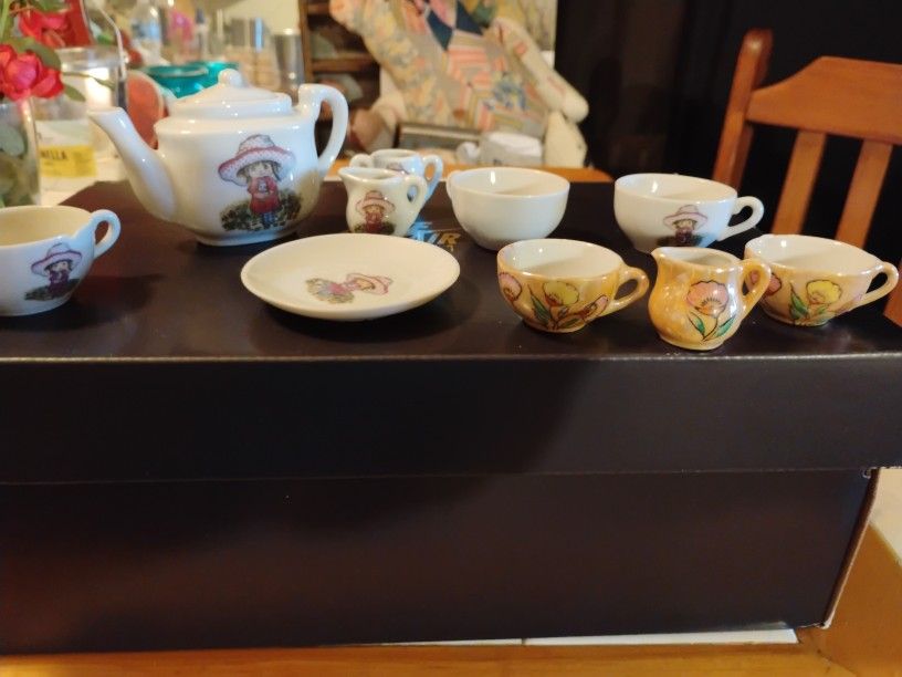 One Strawberry Shortcake Seven Piece Set And One Floral Three Piece Set Miniature Teapot Set