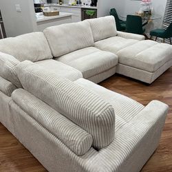 New 4 Piece Modular Sectional.  Off White/Beige Corduroy Fabric.  90”x127”x66”.  Free Delivery!