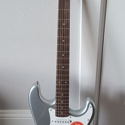 Squier Guitar, Fender Amp and Cables