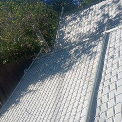 Two Rolling Gates . 6 Ft High With Privacy Slats