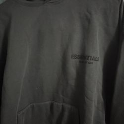 Essential hoodie in black size is medium