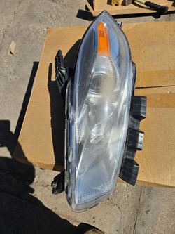 Dodge dart left Headlight oem