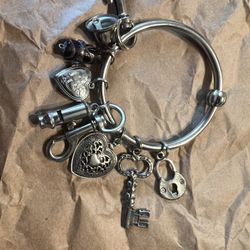 Bangle with extra charms.