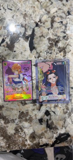 One Piece Heroines edition vol 2. Nico robin Leader alternate art and Nami Secret rare.