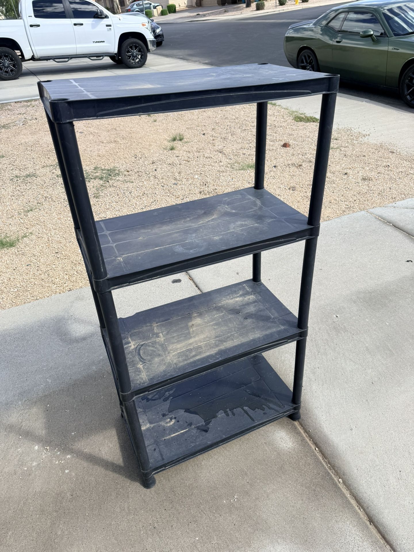Black Plastic Four Level Shelf (LxWxH: 27” x 15” x 53”)