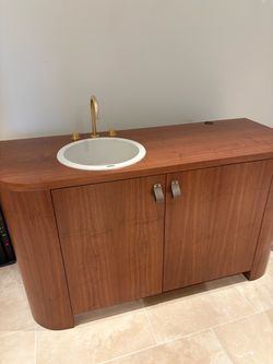 Bathroom sink and cabinet