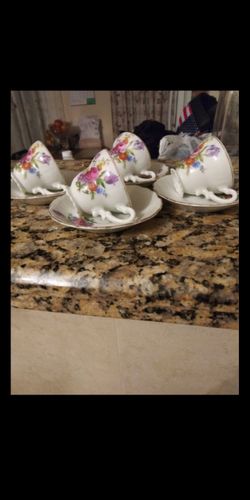 4 cups and 4 saucers fine porcelain