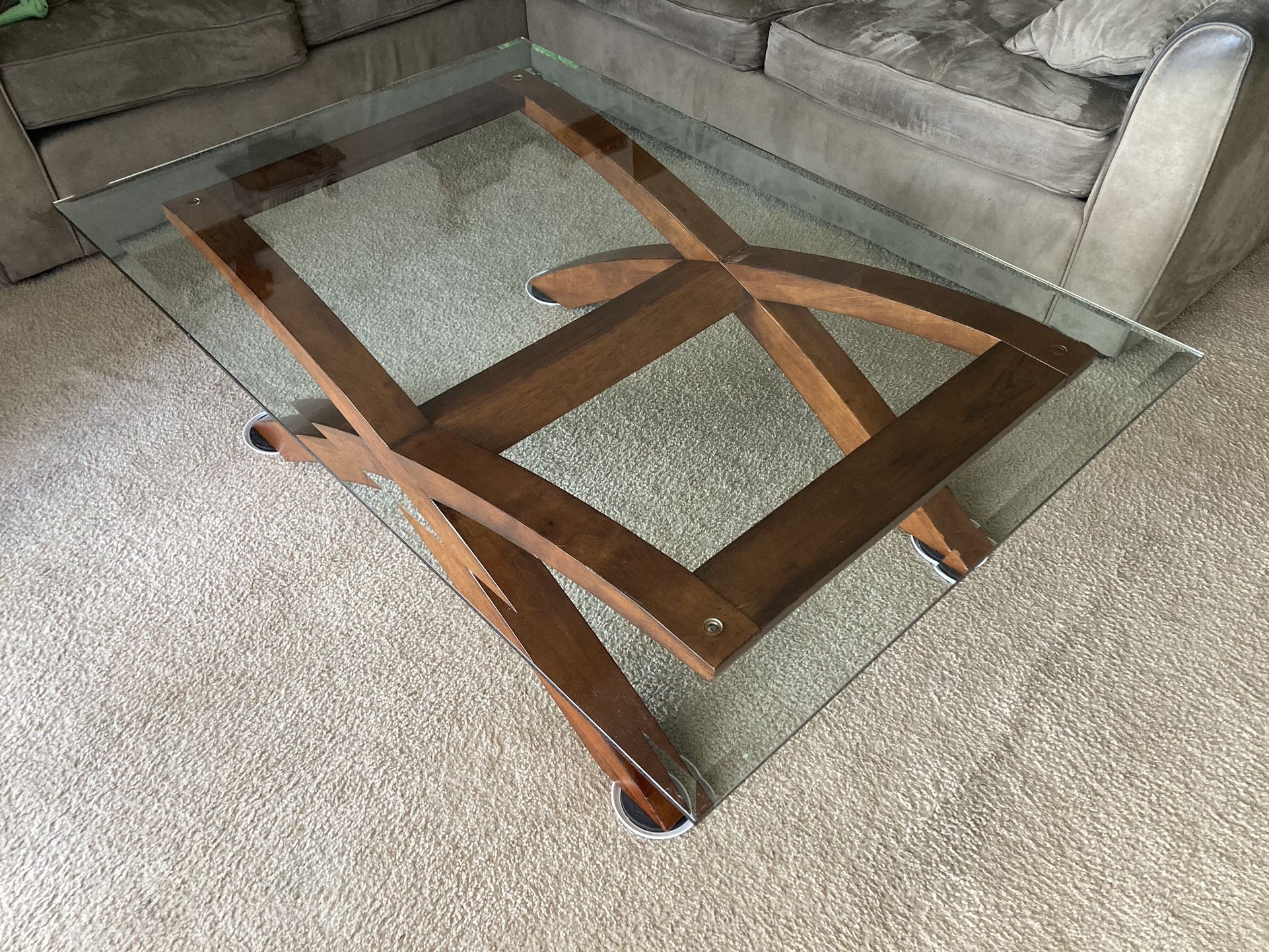Elevate Your Living Space With This Mahogany Arched Legs Coffee Table With Beveled Glass Top
