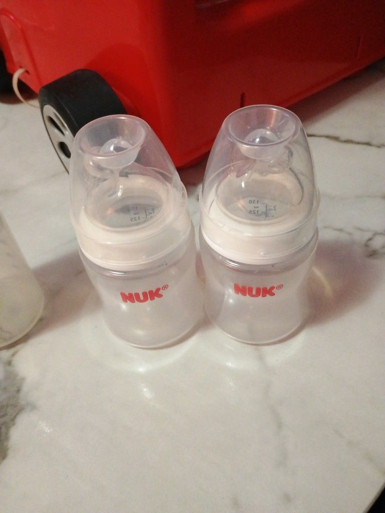 Set Of Two NUK Bottles