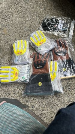 Six packs of brand new gloves mixed