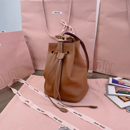 New hand-stitched leather bucket bag