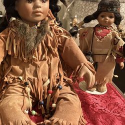 Two Native American Dolls.