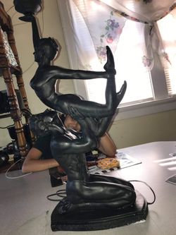 Hurry now this is a collectible 1992 ceramic statue for the low