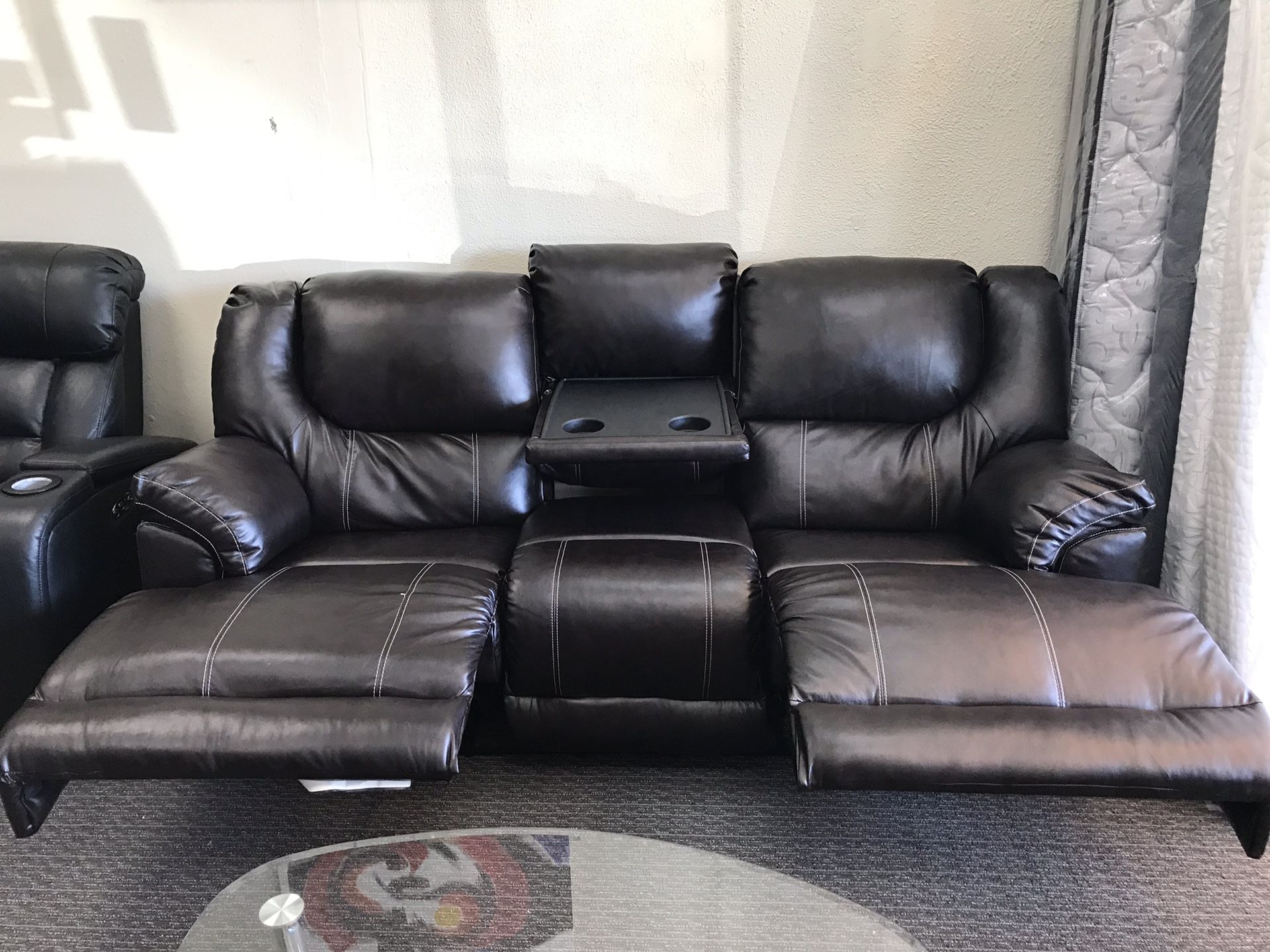 Sofa recliner with drop down table