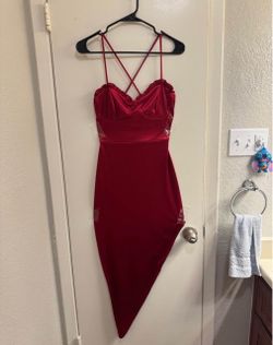 Red dress shows leg
