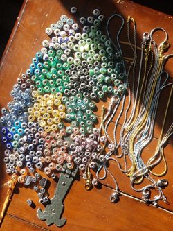Tons of glass beads and bracelets and necklaces