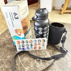 32 oz insulated steel bottle with 63 stickers