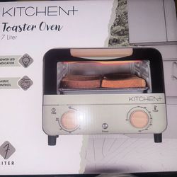 NEW IN BOX TOASTER OVEN.