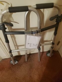 Brand New Adjustable Walker Folds Up When Not Used Has Front Wheels Made By INVACARE