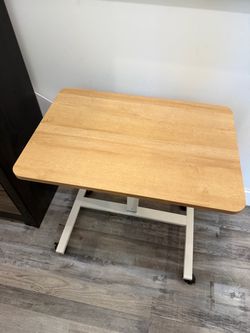 Sit to stand desk