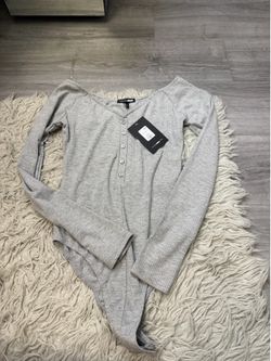 Brand new women's bodysuit S