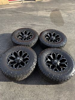 FINANCING AVAILABLE Fuel Assault 8x180 20" Wheels with 37" Toyo AT3 Tires