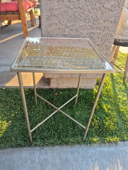 Small table,  Metal Fame and glass top, please see all the pictures for details and measurements