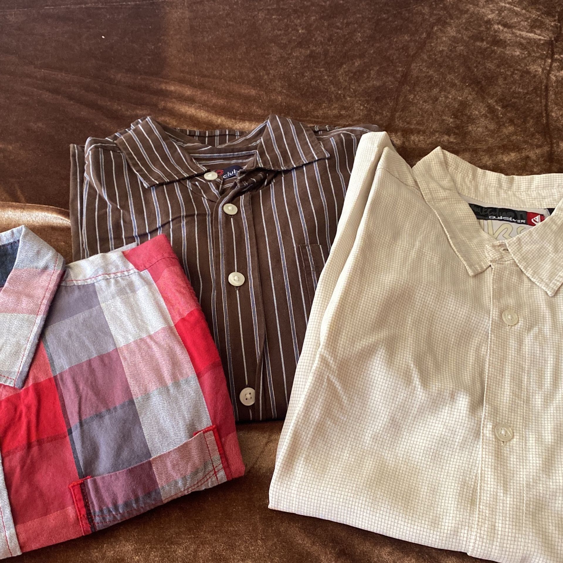 Boys button up shirts only worn a couple times in good condition no holes, no stains. Smoke free home . Prices vary on each shirt.