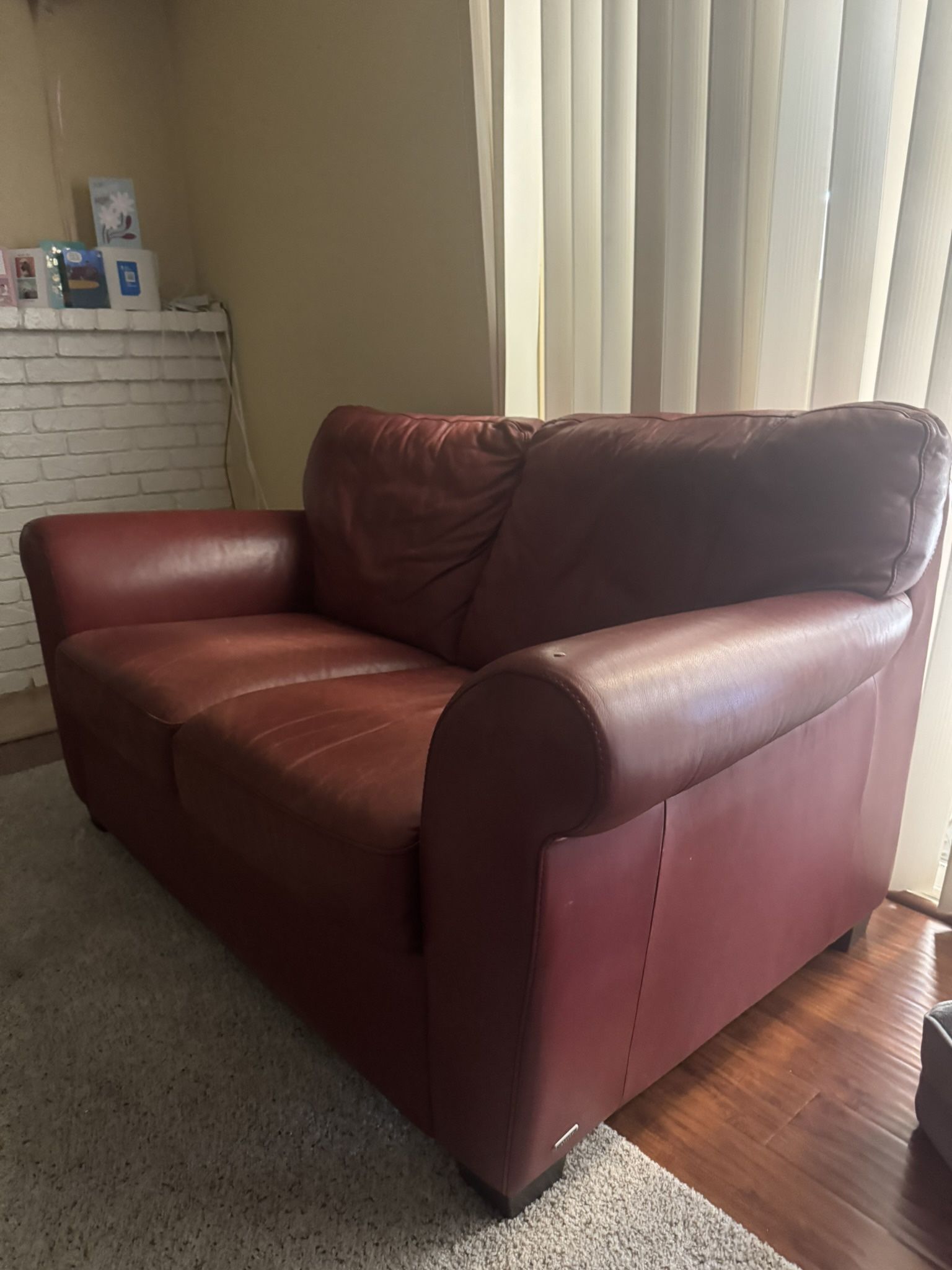 Dark Red Leather Love Seat