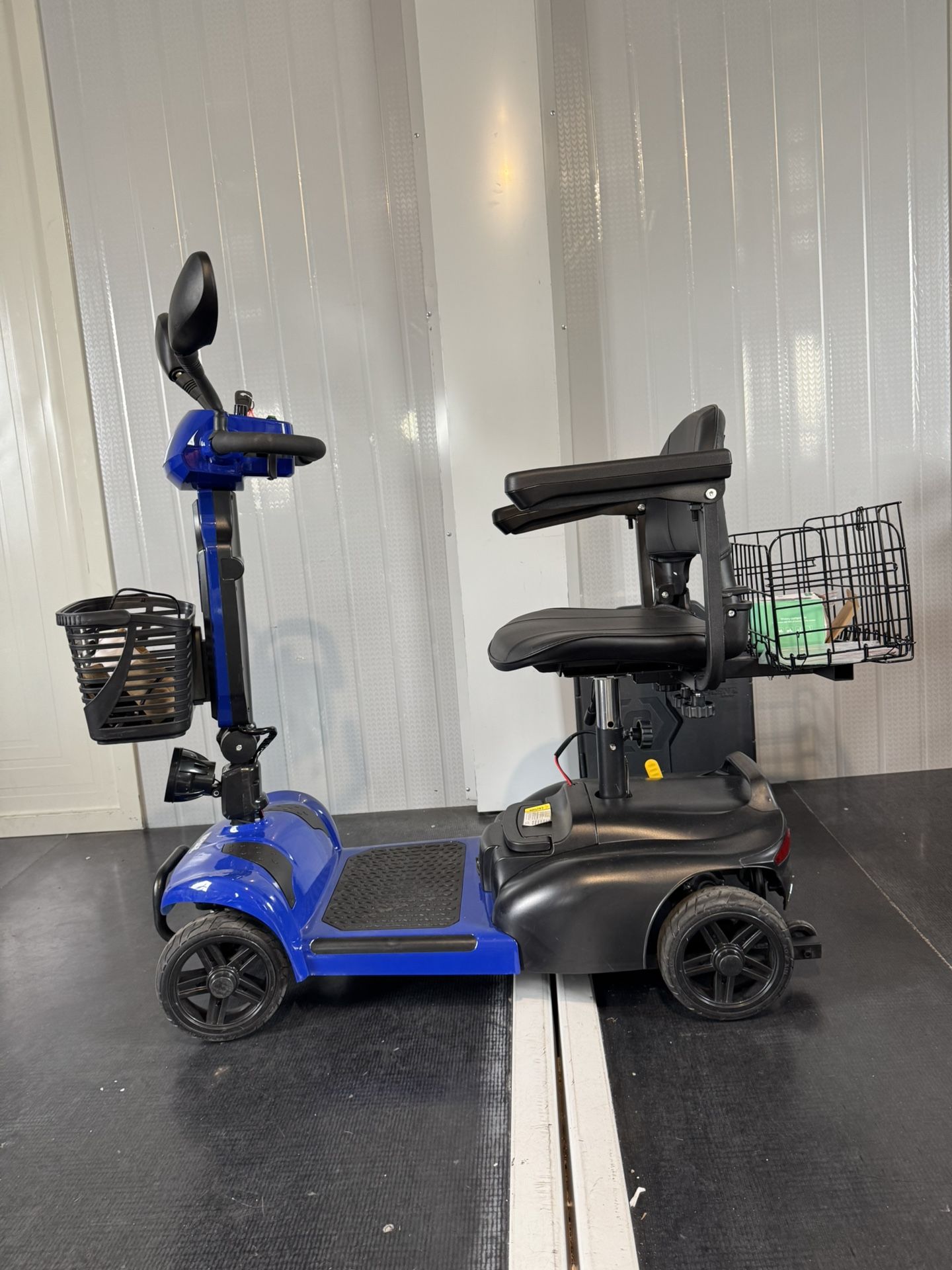 Four wheeled electric scooter