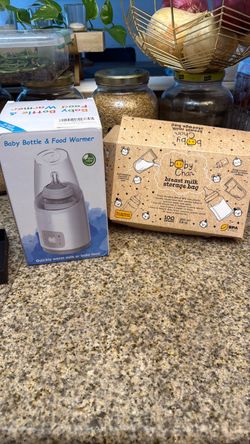 Baby bottle warmer and milk storage bags
