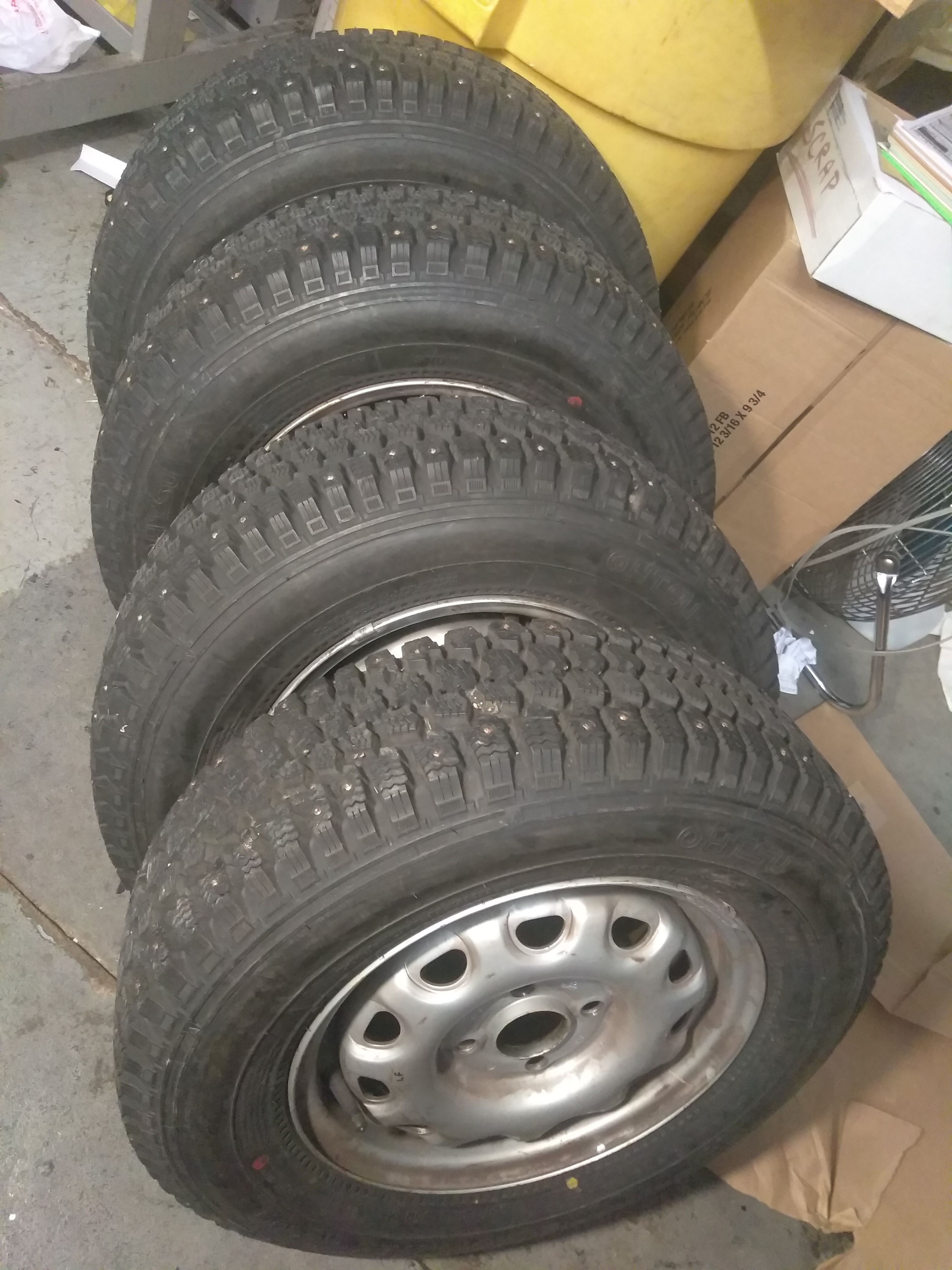 4 studded snow tires size 185/70R13