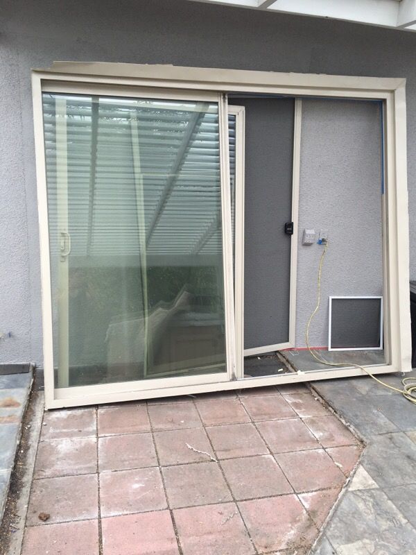 96" x 72" sliding glass door. Beige
