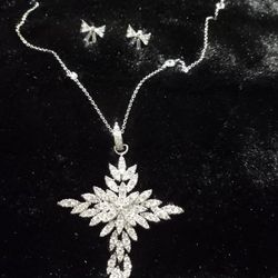Gorgouse Sterling Silver Dangling Cross Necklace With Matching Sterling Bow Tie Earings 