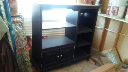 Black shelving entertainment unit