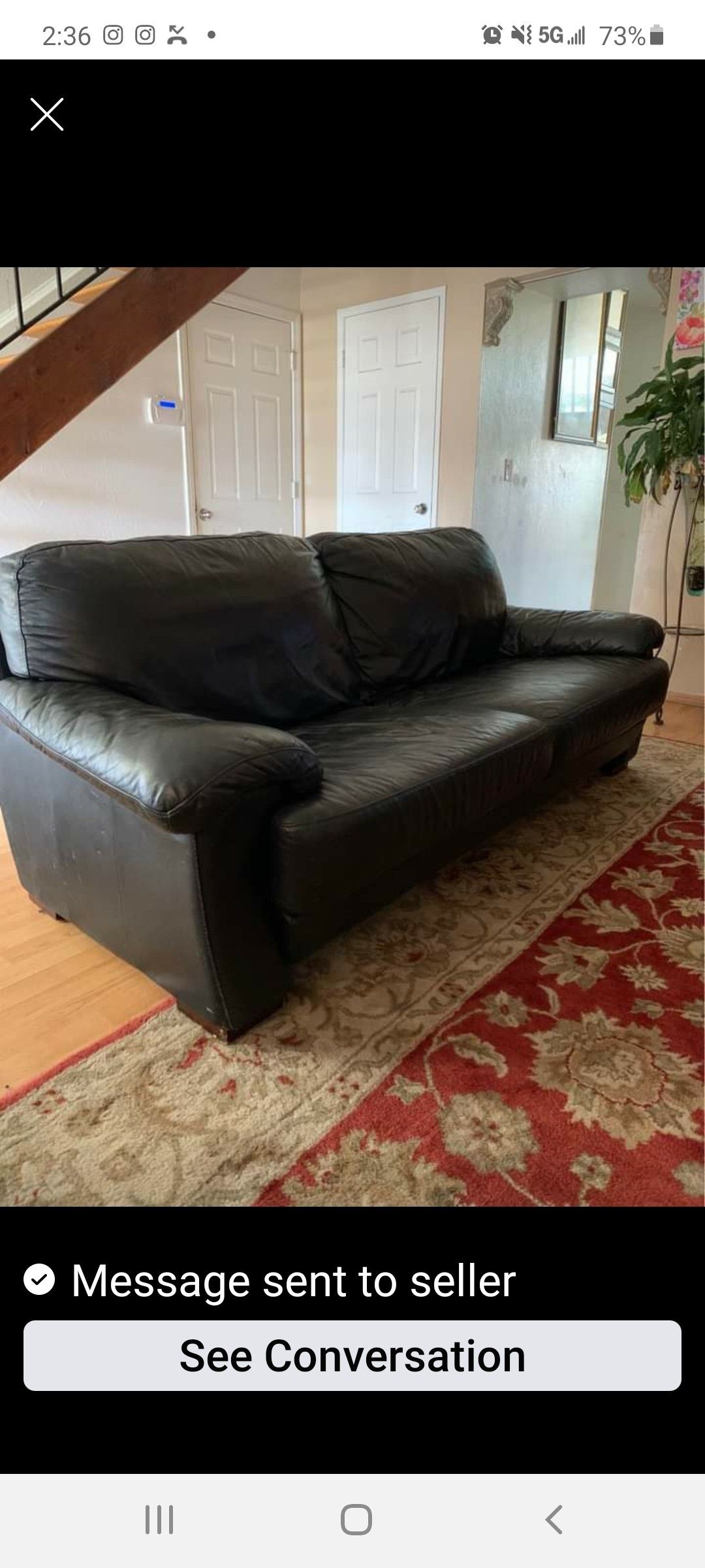 Black leather sofa