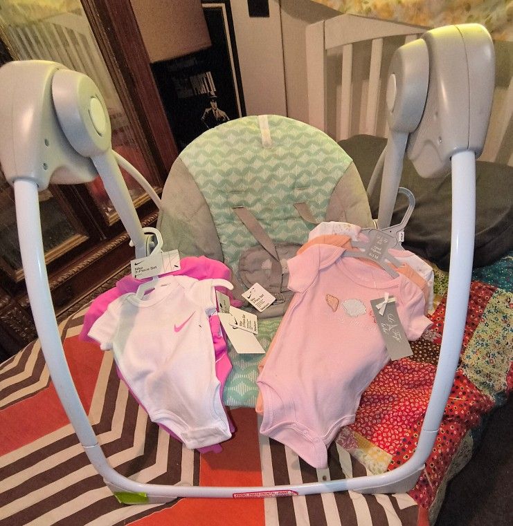 Baby Swing And Clothes Size 0-3 Months $15
