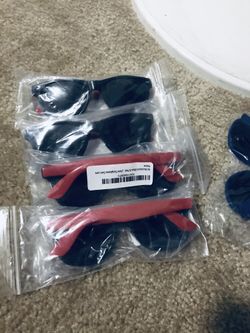 Black sunglasses with red side
